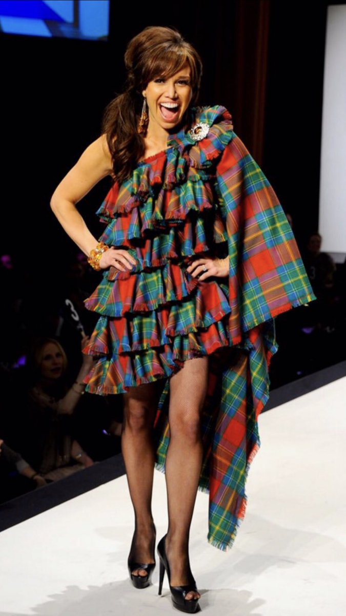 ClanMhuirich's tweet photo. As #virtualtartanday turns to the cocktail hour in the Eastern US, we spy NBC hostess @sara_gore sporting a fantastic evening dress in Ellis Island Tartan by Michael Kay Couture. @StatueEllisNPS @EIHonors @StatueEllisFdn @saveellisisland @StatueCruises @CelticLife @nyctartanweek https://t.co/N4S9IkhTRi