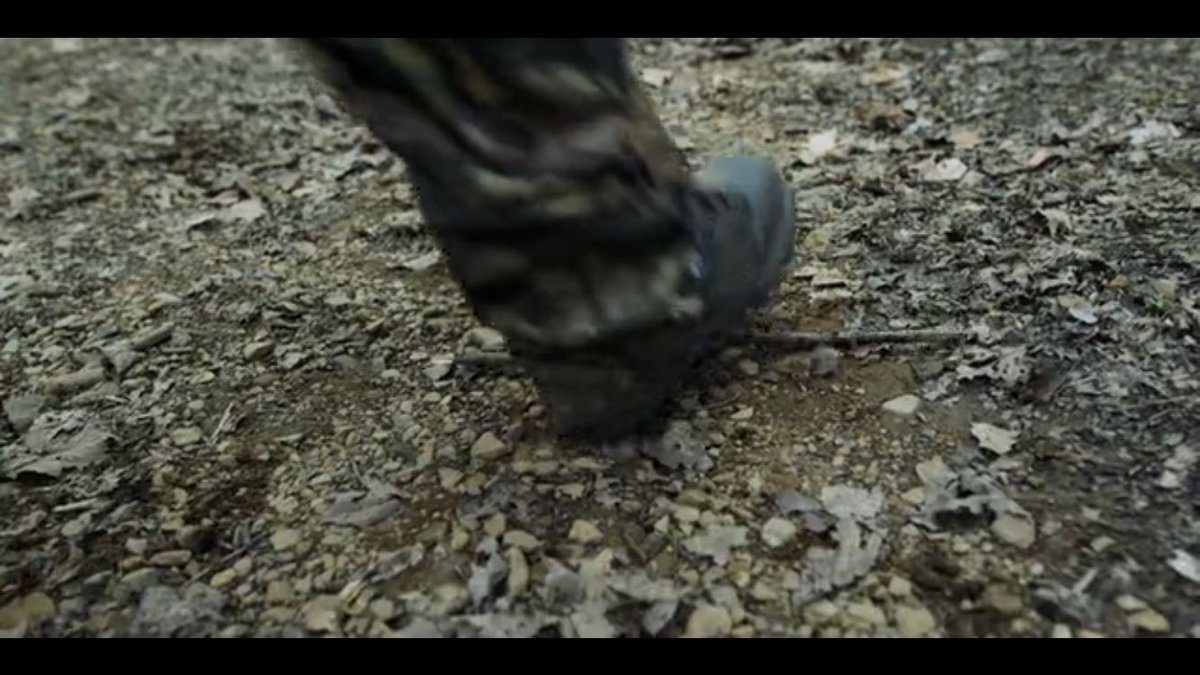 In this 1st frame, we see a character eating chips. In the second, our main character steps on a twig. But the break of the twig sounds like the crunch of a potato chip. A small subconscious connection between scenes to ease the shift in tone.