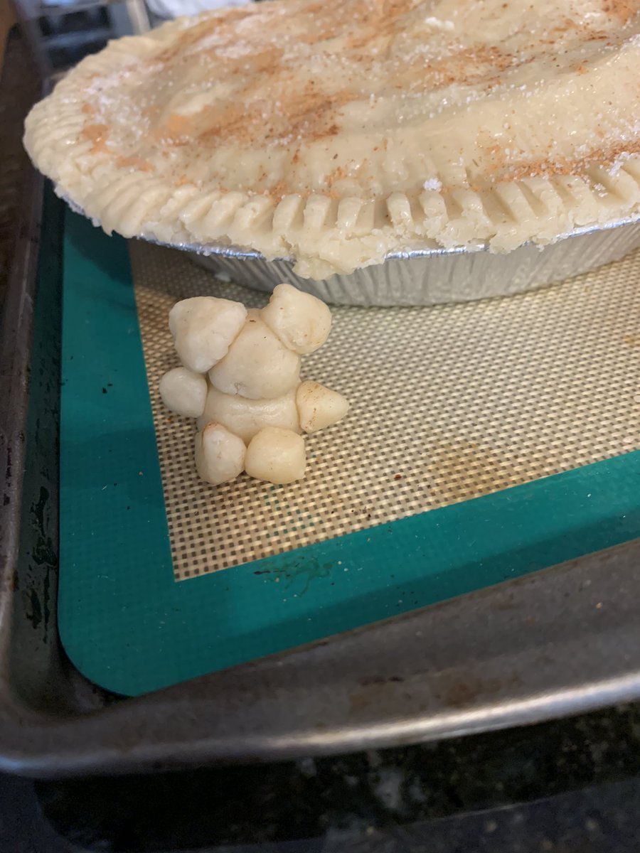 Top your pie with a generous layer of butter (I mented 1 tbsp) sprinkle on some sugar and cinnamon, make a tiny pal for your pie, cover the edges with some aluminum (will be removed halfway) and send her off into the oven for 50-60 minutes 