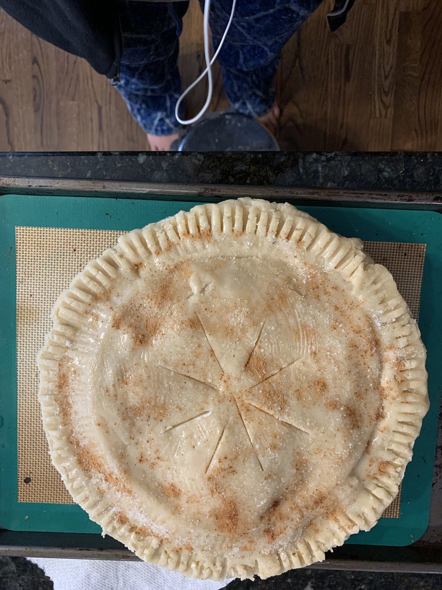 Top your pie with a generous layer of butter (I mented 1 tbsp) sprinkle on some sugar and cinnamon, make a tiny pal for your pie, cover the edges with some aluminum (will be removed halfway) and send her off into the oven for 50-60 minutes 