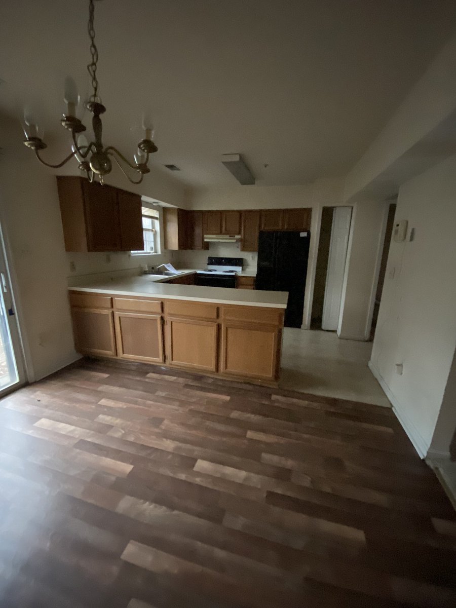 Before and after.Removed those cabinets on the left to make shelving to open it up. I hate these lights now.