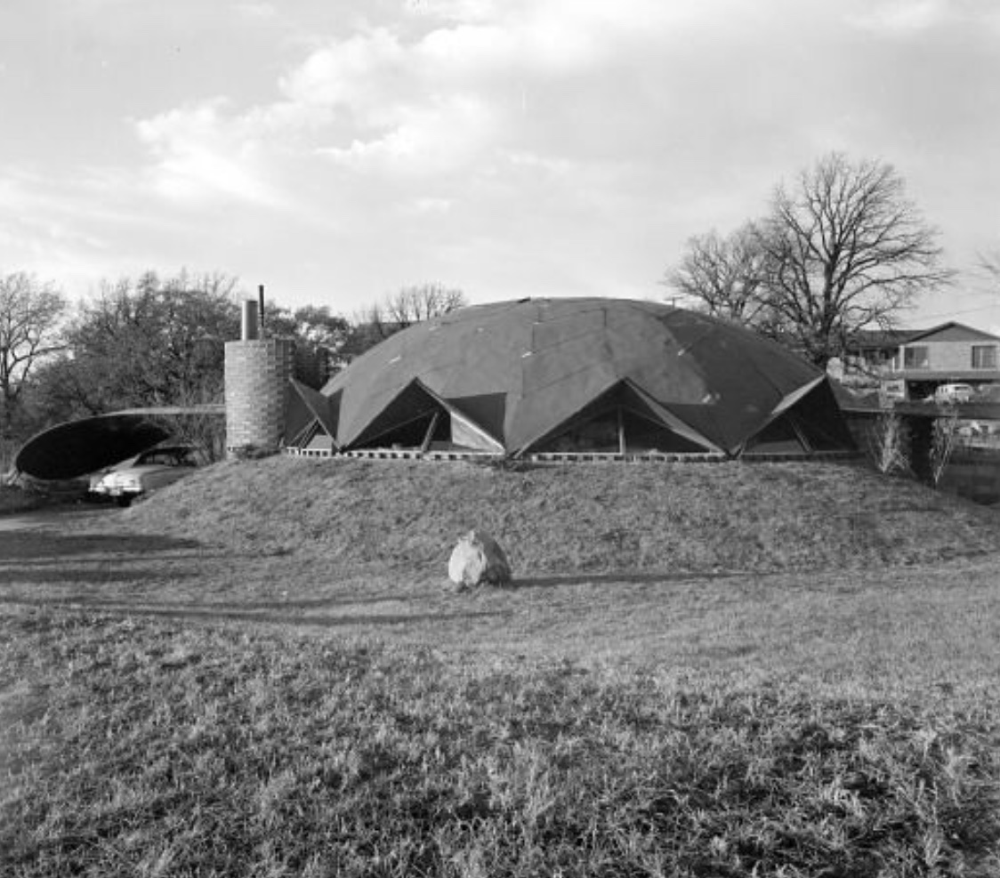 James Dresser designed this home for his own family between 1952-53 in Madison, Wisconsin. The home is technically a monodome - a 28-ton concrete shell built on a radial framework of curved steel beams. (Interior photos by Dwell/Old photo by Wisconsin Historical Society)