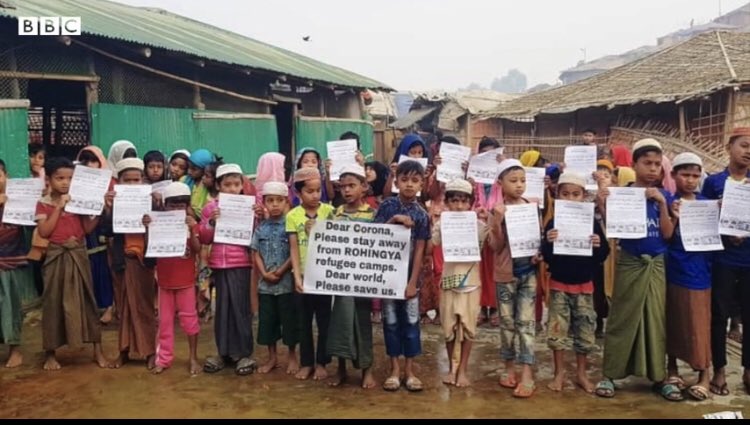 This photo sums up this thread. “Dear  #Corona, please stay away from  #Rohingya refugee camps. “Dear world. Please save us.”Photo: Azimul Hasson. Videos in the thread of Saydur and and camps -  @OmarMushfique. END.