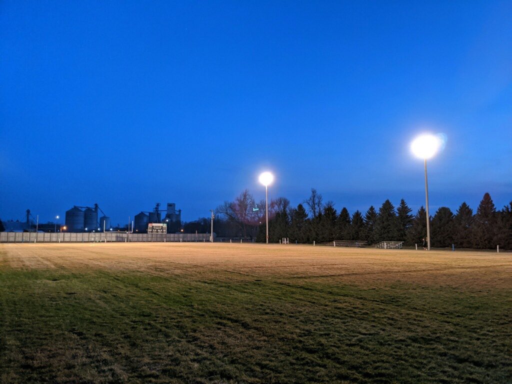 JaredBourquin's tweet photo. A look at Heron Lake laker field.  “Happiness can be found in the darkest of times, if one only remembers to turn on the light.” #BeTheLightMN @MSHSLjohn https://t.co/hTVOCKopRC