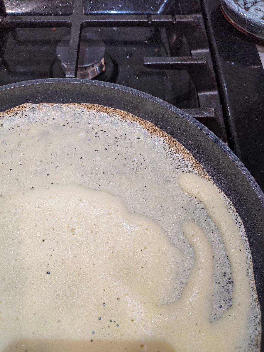 You want to wait till the edge is cooked to flip it, but really not much longer. This photo here is almost too long.