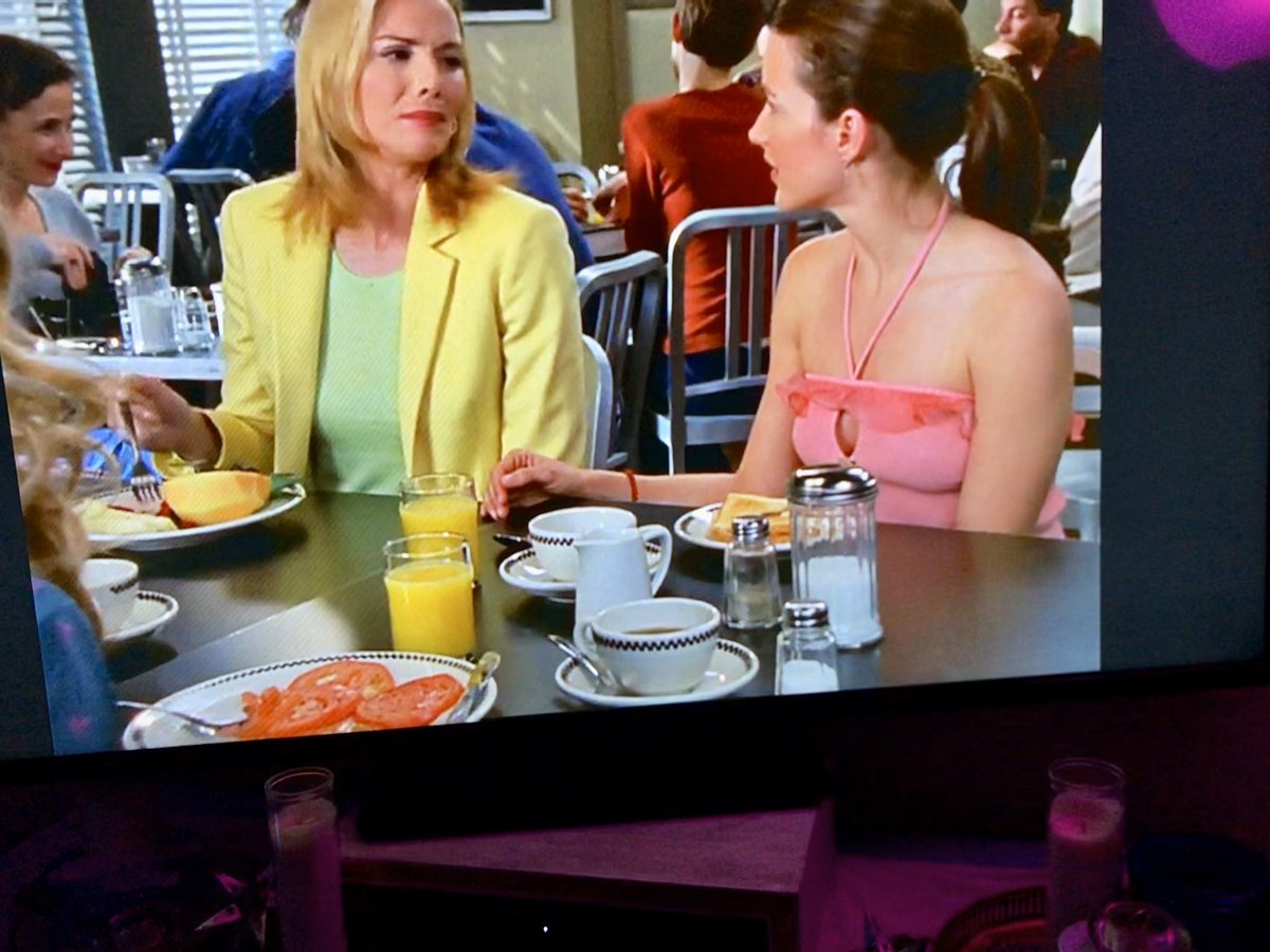 why is carrie bradshaw eating 4 slices of tomato for breakfast with her girls