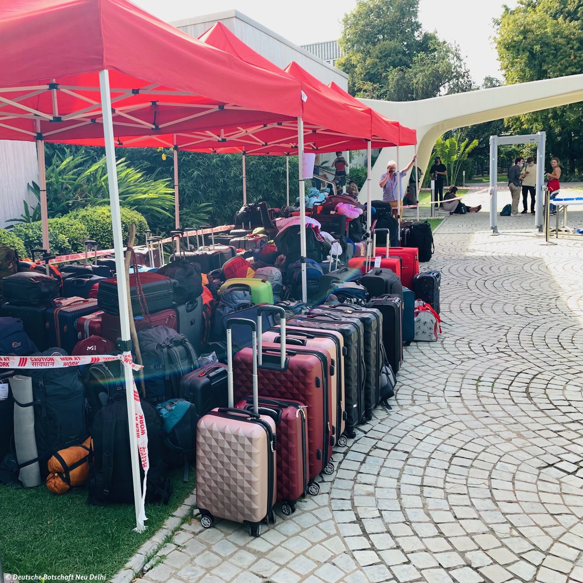 GermanyDiplo's tweet photo. We’re going home! Over 500 stranded tourists in 🇮🇳 looked forward to their return flight to 🇩🇪. @germanyinindia opened the embassy garden for the last hours they had to wait. A spot of relaxation prior to their departure. Thank you @AmbLindnerIndia &amp; the @GermanyinIndia team! https://t.co/Eagh2RQ6C0