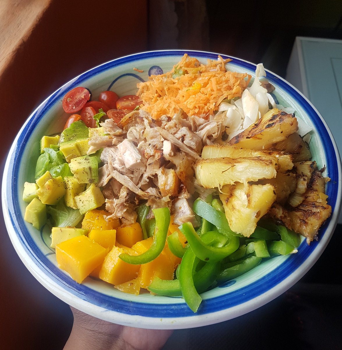Quarantine cuisineLunchI was going for a tropical vibe so made a salad with grilled turkey, lettuce, avocado, cherry tomatoes, carrots, green peppers, mango, coconut chips and grilled pineapples