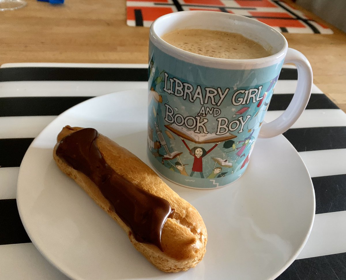 BookSuperhero2's tweet image. Taking time out for an eclair and a coffee in my new mug 😁 #LibraryGirlAndBookBoy