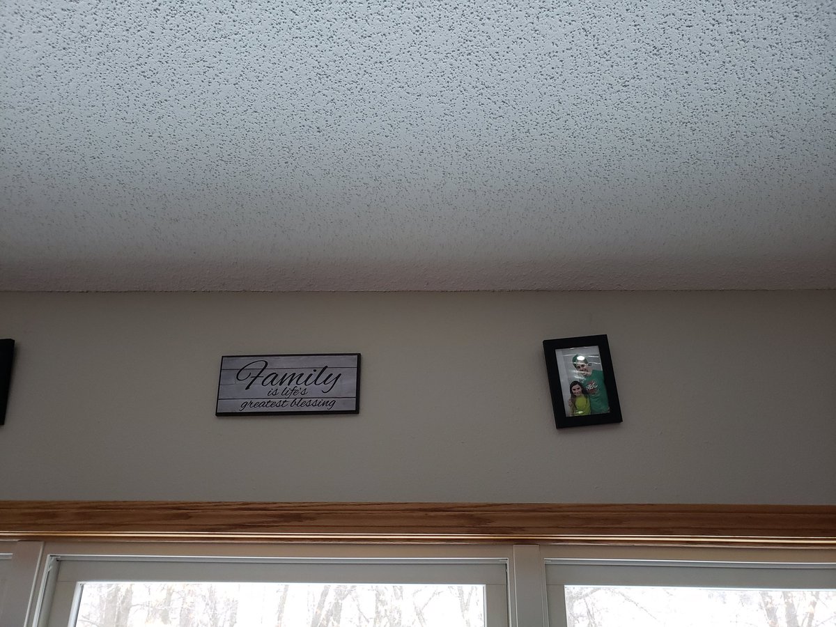 Nuclear_Ninja's tweet photo. @CaptainNBC we hung up new family pictures on the wall and my daughter picked this one over a picture with me...... welcome to the family I suppose! https://t.co/koqxgMEIwk
