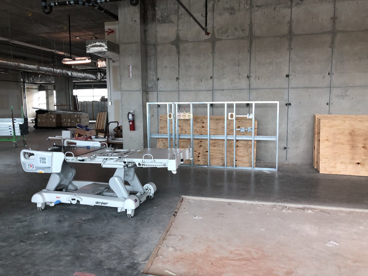 SDECoxHealth's tweet photo. Early construction images of the 51 bed ward style COVID related unit being built at Cox South. This will augment current capacity, and would only be used in an emergency. Thank you to our state and city who approved in hours not weeks. Goal-available in 2 weeks. https://t.co/bl5zoby8q8