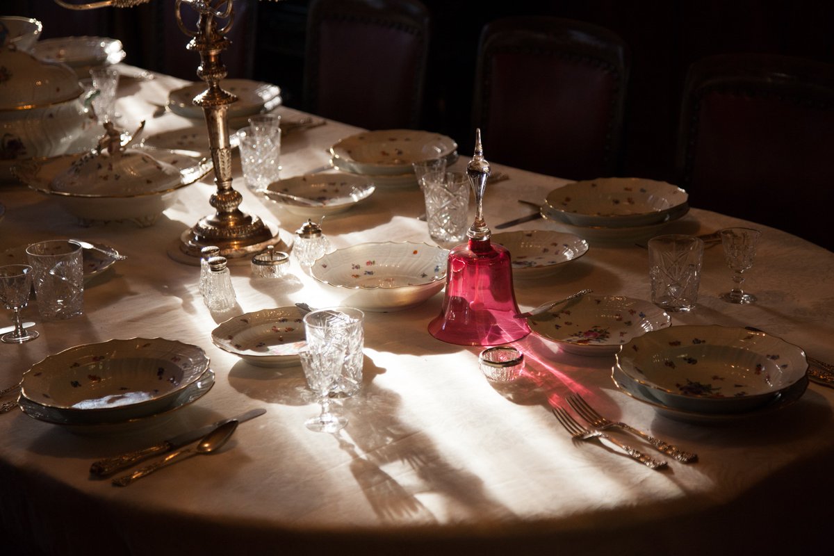 OKeefeRanch's tweet photo. The beautiful cranberry glass bells in the O'Keefe Mansion - each bell makes a different sound, so service staff would know if the lady or gentleman of the house was ringing #museumfromhome https://t.co/75hLYBzub1