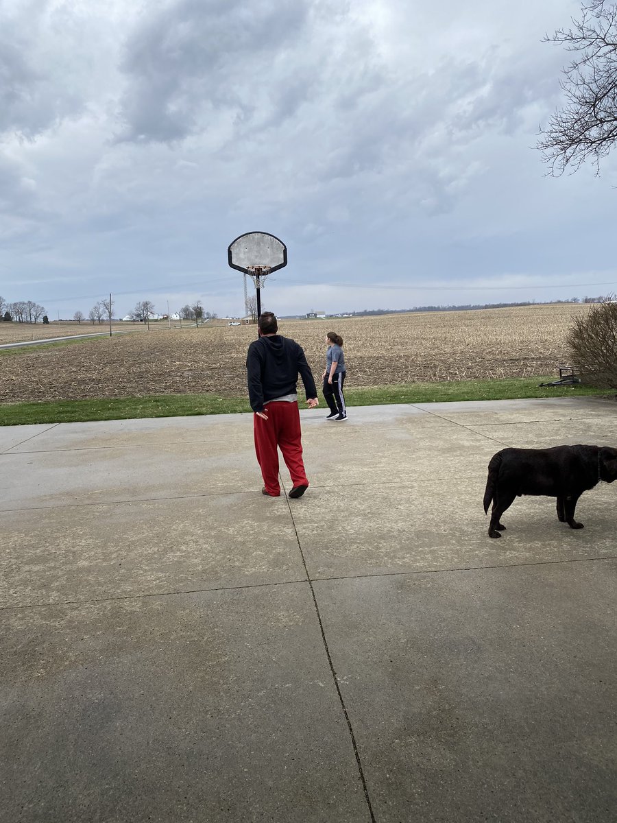 VorheesSeth's tweet photo. It’s been a long time since we have played basketball in the rain as a family! Maybe this quarantine is a good thing! #TeacherbyTrine #BackinOhio https://t.co/MVxXdWZ8P8