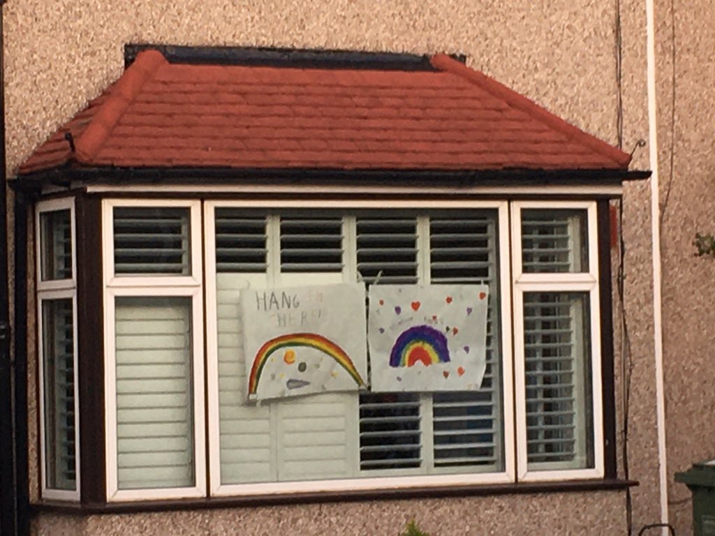 The kids in my ends are putting up big rainbows on their homes. I hadn’t heard about this. Is it a widespread thing or a local custom? Does it have a meaning ir just making the world nice?