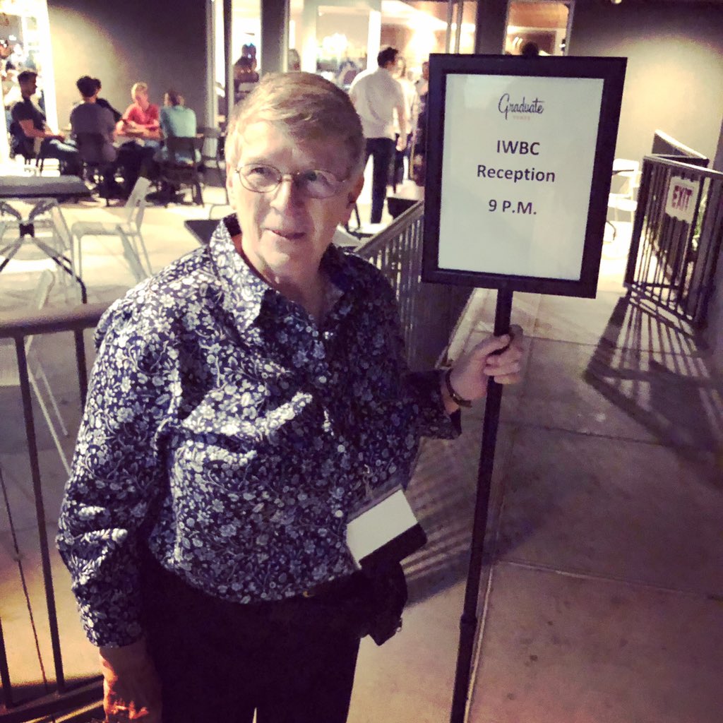IWBC_BRASS's tweet photo. Throwback to when we could gather together! Here’s Susan Slaughter ready to welcome everyone to our opening reception at #iwbc2019 Let’s stay close from afar, until this time has passed. Sending good vibes #socialdistancing #staystrong https://t.co/pNh9aUG5E6