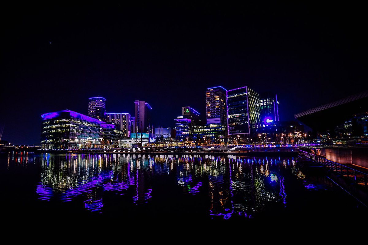 CityLifeManc's tweet photo. Our beautiful city lit up in blue and ringing out with applause is a sight and sound we’ll never forget. Thank you to all the NHS staff and key workers working tirelessly for us all 💙 #clapforourcarers #ClapForTheNHS https://t.co/kA9GtZbbGM