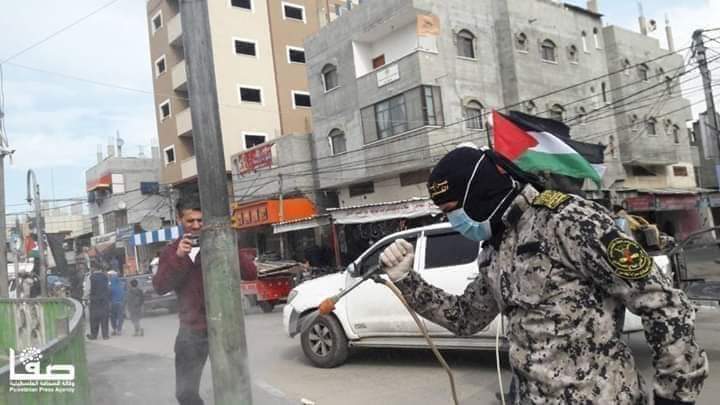 JoeTruzman's tweet photo. Members of the militant group Palestinian Islamic Jihad disinfect areas of the #Gaza Strip in attempt to prevent the spread of #COVID19. https://t.co/w1hX5PI4X0