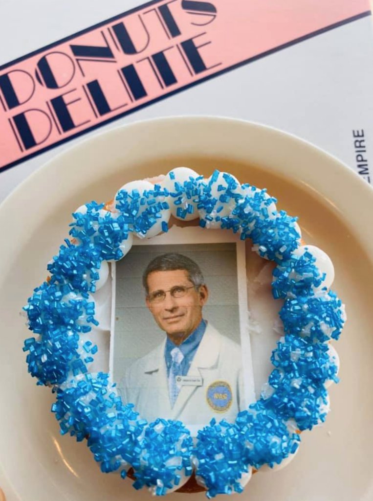 CBSNews's tweet photo. Dr. Anthony Fauci has become the face of the Coronavirus Task Force — and now he's also the face of @Donuts_Delite's most popular doughnut.

The shop told CBS News that it's completely sold out of the doughnuts, but plans to make more "all night long." https://t.co/FIQBAdqrg9 https://t.co/8UH81yRsGY
