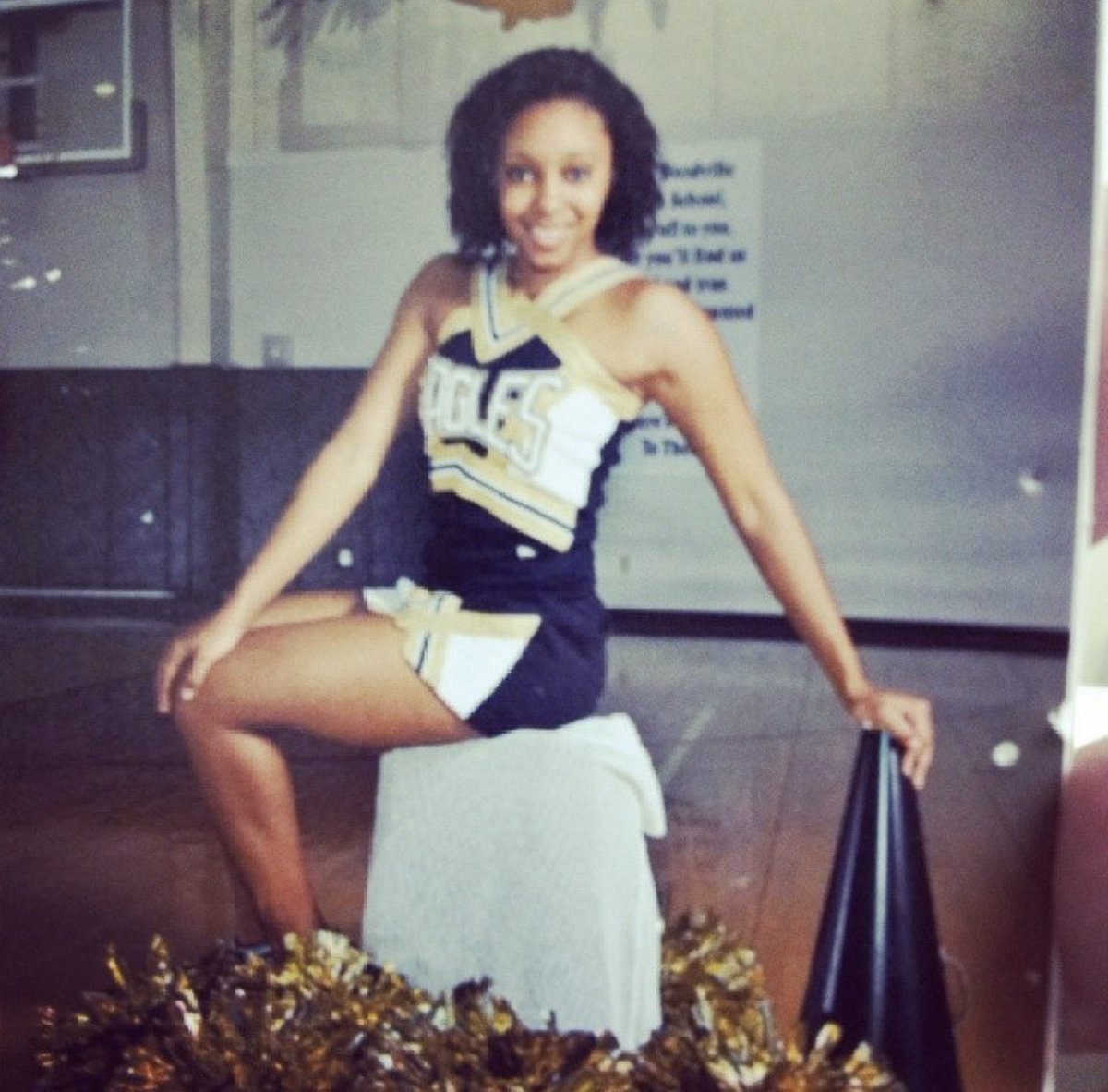 CheerEisenhower's tweet photo. Coach Brooks has been a BLACK AND GOLD EAGLE for quite some time 🦅 #TBT High School Senior year! 🙈 @Eisenhower_AISD https://t.co/pNIRMeiQVp