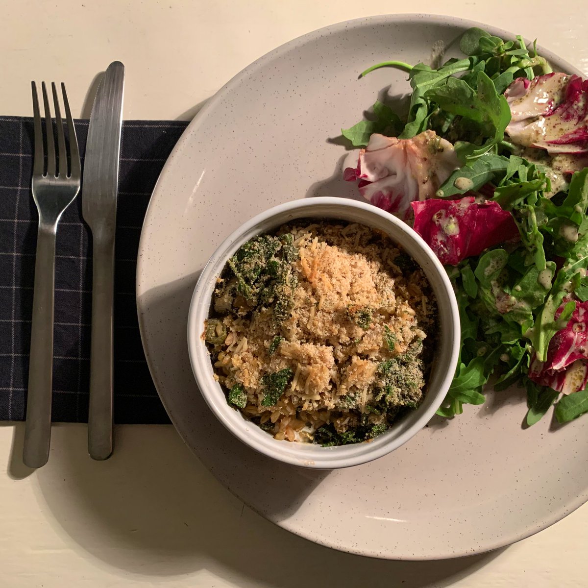 this is baked cauli and farro w panko crumbs, sage and fontina. whenever i make individual casserole portions or pies i think of my g-ma roma - she used to make bird-size but proper meals for herself every night 