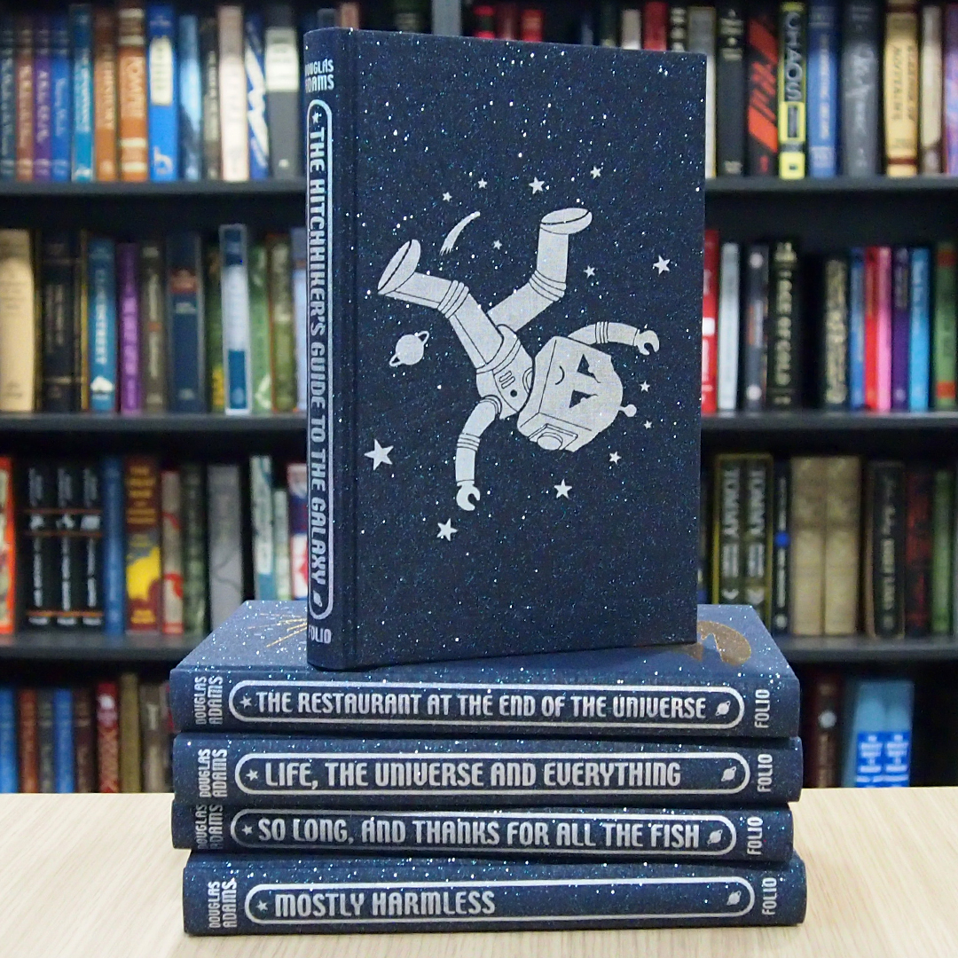 foliosociety's tweet photo. *GIVEAWAY* This month marks 42 years since the original radio broadcast of The Hitchhiker's Guide to the Galaxy! You could win the entire 'trilogy of five', illustrated by @jonathanburton. Follow and RT by midnight tonight to enter! Open worldwide. https://t.co/rCItiPh9Dm https://t.co/3M4pW1kl8T