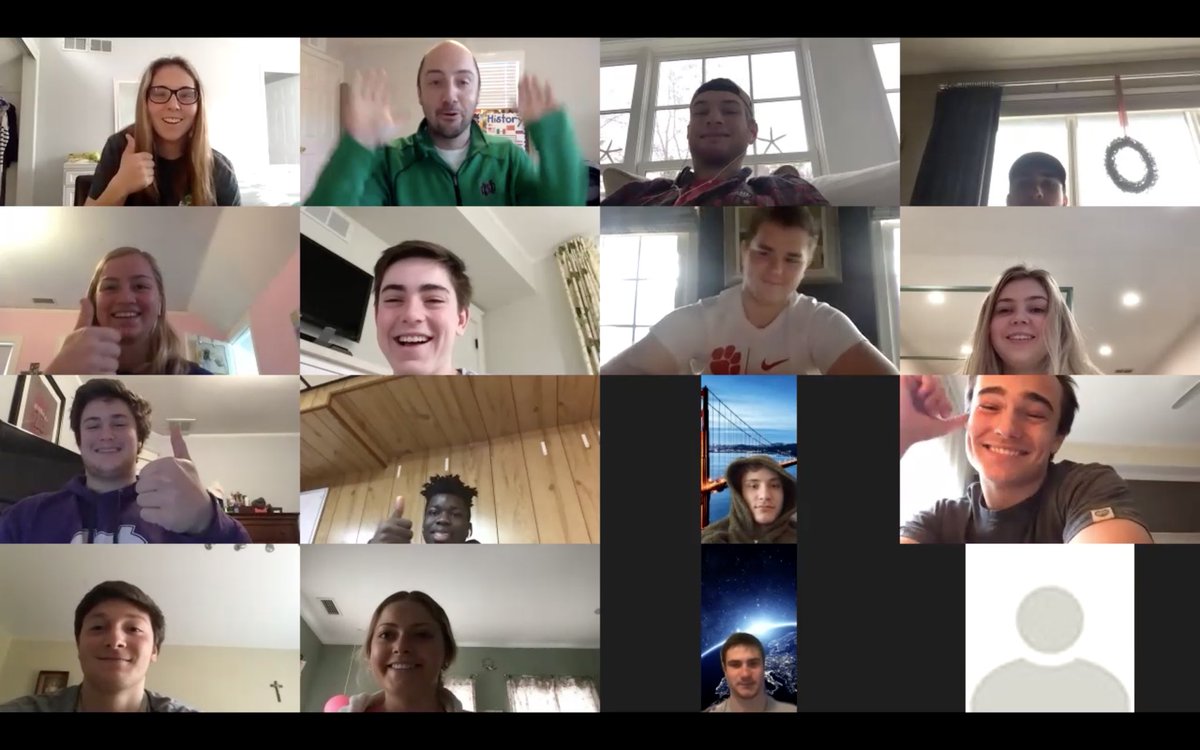LoyolaAcademy's tweet photo. Social Studies Teacher and #LAalum Mr. Mark McGuire ‘06 raises the roof for Democracy with his political science students during a recent Zoom class meeting session. @LAAlumniNetwork #goramblers https://t.co/pKDGvbbqj7