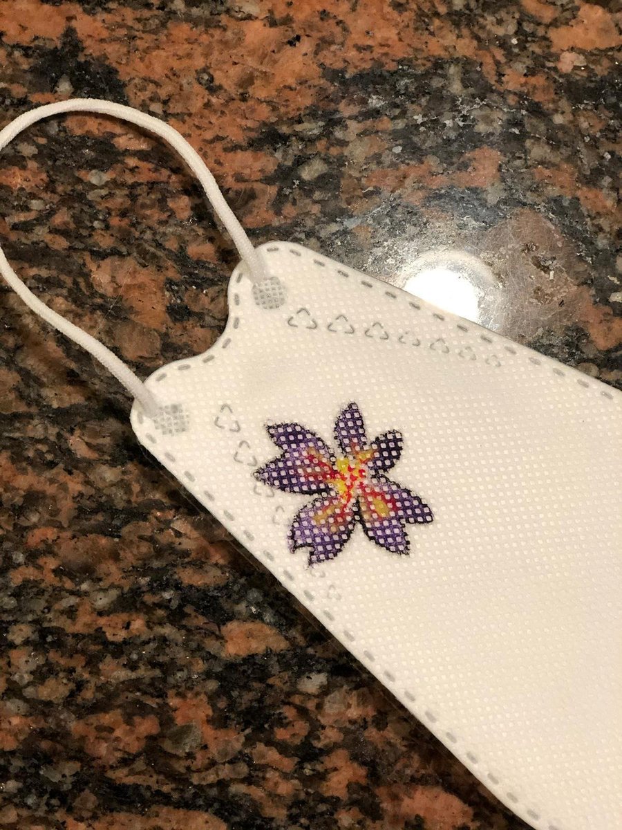 AJTow's tweet photo. When my mom saw the flower symbol yesterday, she wanted me to draw hers as well. Turns out, I created an orchid flower symbol. One of her favorite flowers.  #Flowerfacemask #Creativesillyidea https://t.co/esgkioaR5y