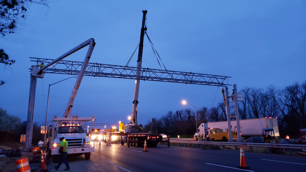 TheMDTA's tweet photo. A little over a week ago, an MDTA crew installed the new overhead tolling gantry between the Bay Bridge and MD 8 on EB US 50/301. #BayBridgeWork continues with this being a key piece in delivering all-electronic (cashless) tolling full-time by this summer. #FrontlineMDOTforYou https://t.co/xOSC2IOkec