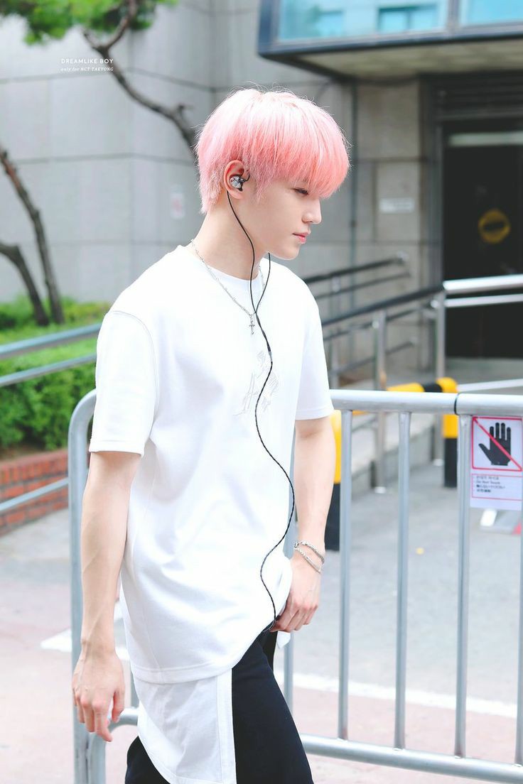 pink haired taeyong during cherry bomb era was really cute and he looked like a fluffy cotton candy