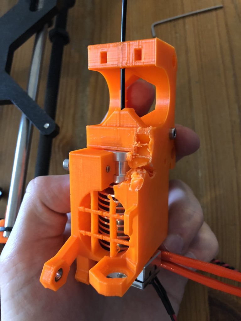 seajayshore's tweet photo. Super glue, cable ties &amp; a thermal runaway issue later mr printer has printed himself replacement parts. 🤖 

Now deciding between keeping it going like this vs disassembling to fix it... https://t.co/Xb5EHVKVrx