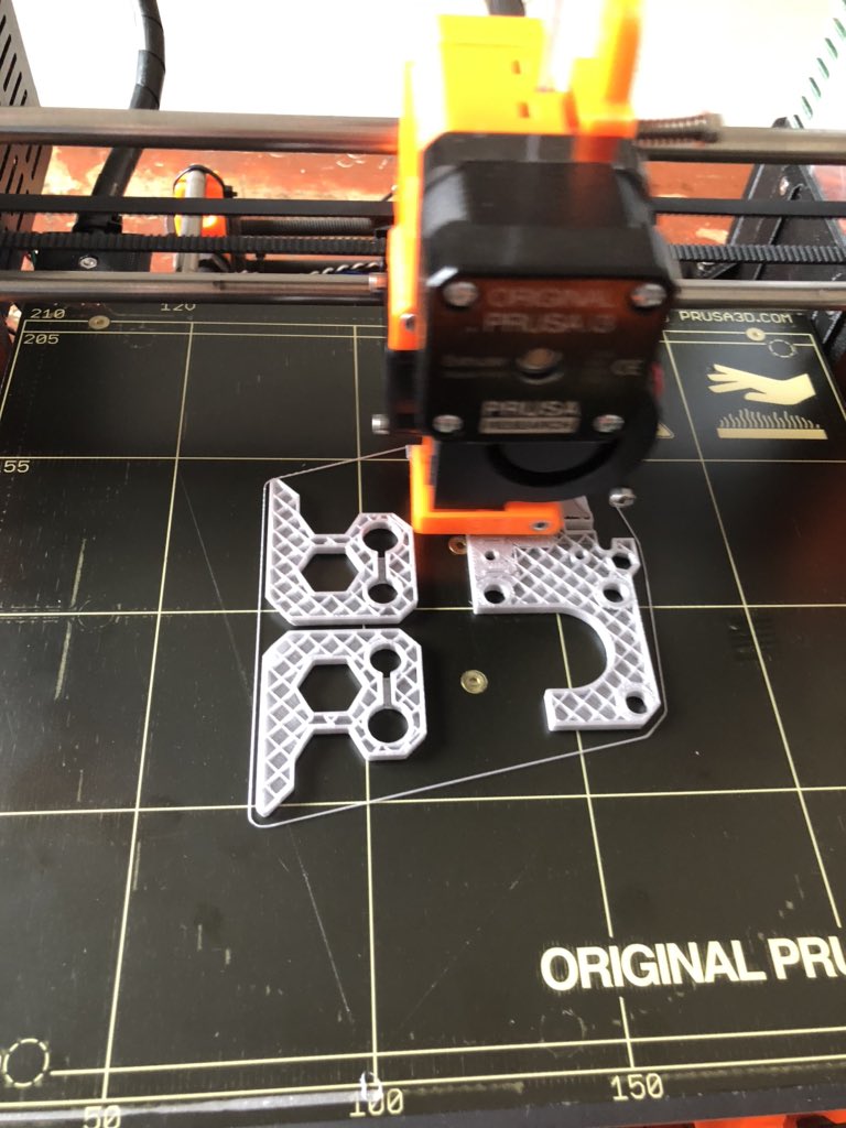 seajayshore's tweet photo. Super glue, cable ties &amp; a thermal runaway issue later mr printer has printed himself replacement parts. 🤖 

Now deciding between keeping it going like this vs disassembling to fix it... https://t.co/Xb5EHVKVrx