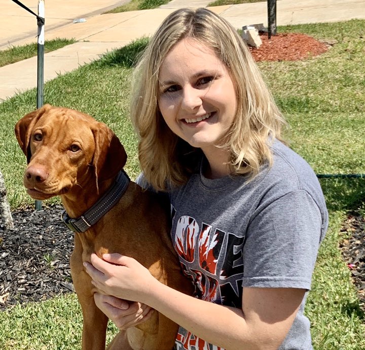 Liz_Earhart's tweet photo. Happy Friday from me and my favorite pup!! @JSES_Stallions ❤️🖤 https://t.co/et1xpPrjgB