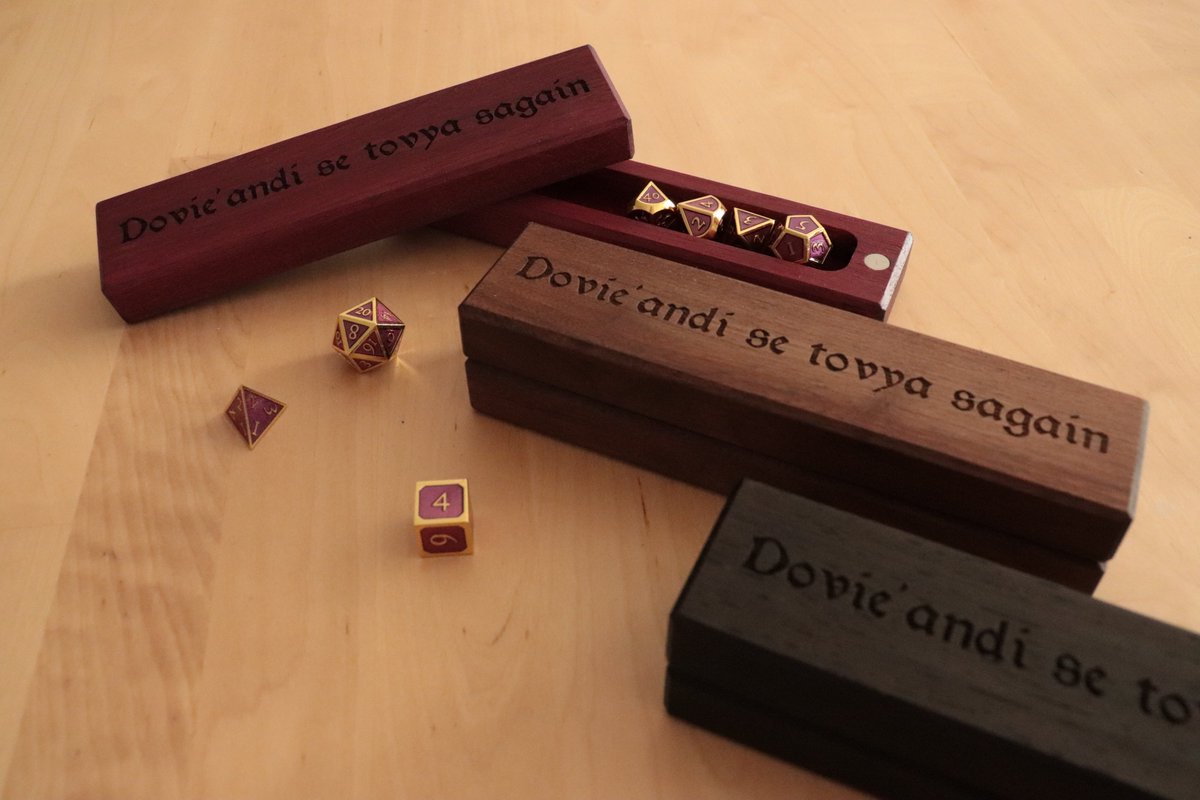 just_role's tweet photo. Check out @WoodgrainGaming on #etsy!!!  They make beautiful boxes for gaming dice and can even custom engrave your order.  One of us may have ordered the hexagonal box with the #dragon chapter heading from #WheelOfTime 😬https://t.co/MvTs7Ixj1a https://t.co/NwhNjv5jXb