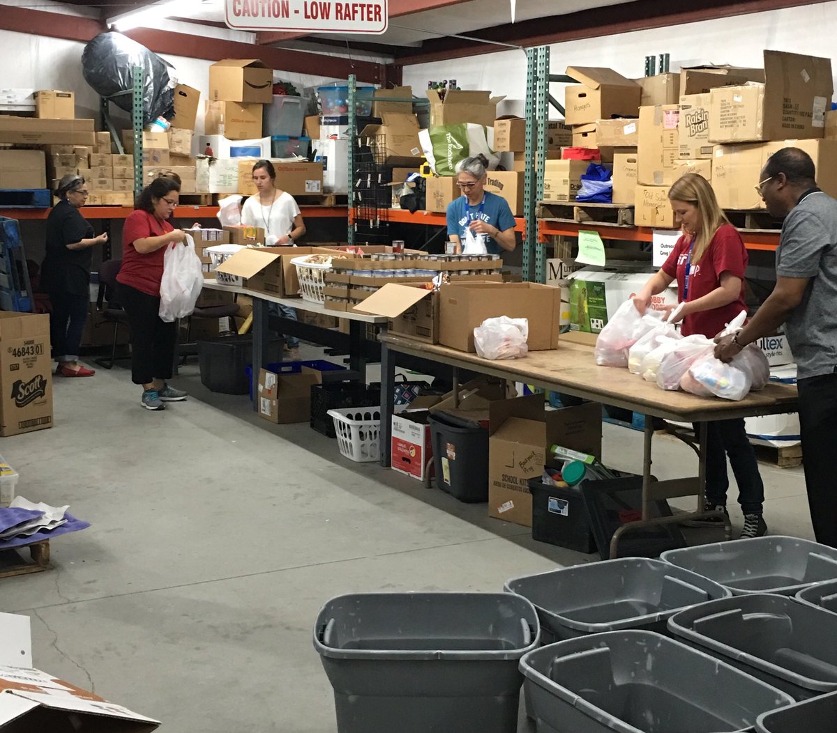 mcsgilbert's tweet photo. ⁦⁦@MCScommunicates⁩, what an amazing school district you are! Crates await learning activities in the Instruction Department...while the Outreach Team prepares weekend food bags in the warehouse.  How proud I am of what you are doing for ⁦@cityofmborotn⁩ families! https://t.co/Tgx4421Qke