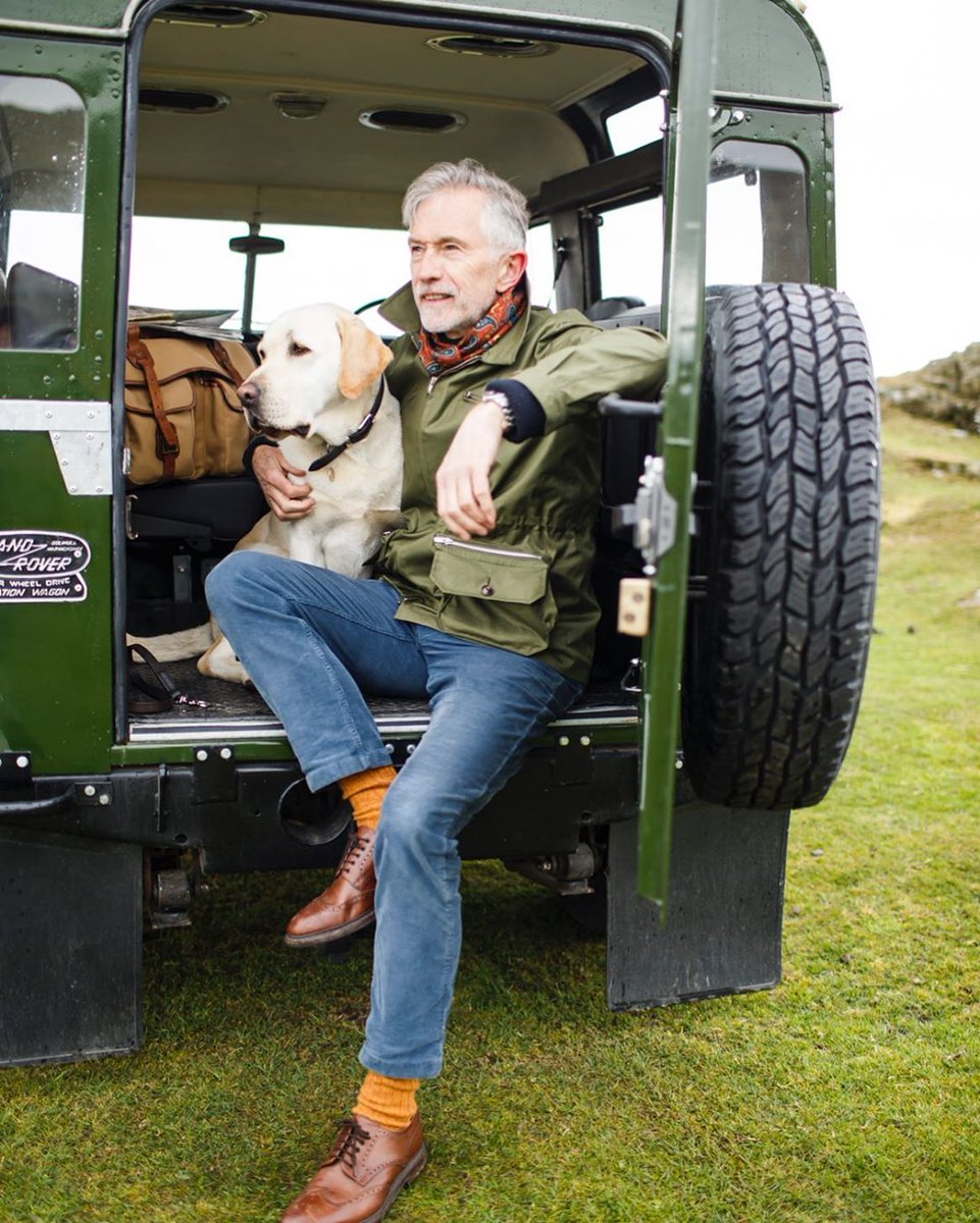 BuddShirtmakers's tweet photo. How are you spending your time social distancing? @greyfoxblog catches some fresh air, wearing a Budd silk scarf. #BuddLondon https://t.co/kh3GZAuo4T