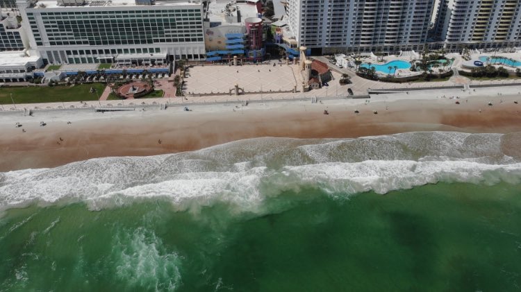 Drone photo of #daytonabeach from <a href="/VolusiaBeach/">Volusia Beaches</a> team. Reminder tho beach remains open, no vehicles allowed &amp; off beach parking has been reduced to discourage crowd. People are required to “social distance”. Boat Ramps &amp; intracoastal party spots w be closely monitored.