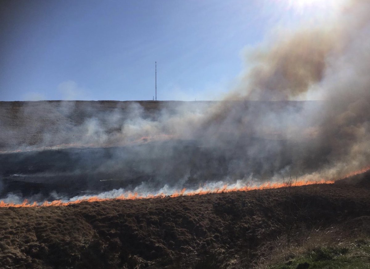 Walton_FIRE's tweet photo. 1 of 2 We have now extinguished the wildfire at winter hill, we will be at @ scene damping down for a few hours, please don’t be tempted to visit the moors, traffic is building up and we still have crews doing essential work in the area and on the road way #stayathome https://t.co/PXaXLHGzNN