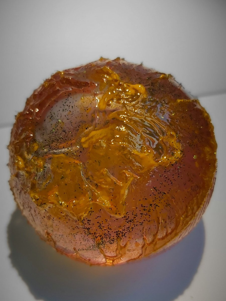 Today's resin experiment not too bad  an unexpected but pretty good looking effect.  I wish I hadn't put the glitter in it would look alot better without it. :-/