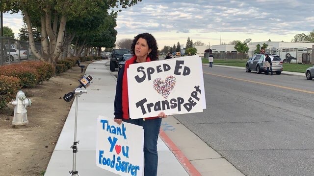KHSD_Official's tweet photo. The Special Ed team woke up bright and early this morning to express their gratitude for our dedicated bus drivers and other transportation staff #KHSDCARES https://t.co/nxRI8fUO8a