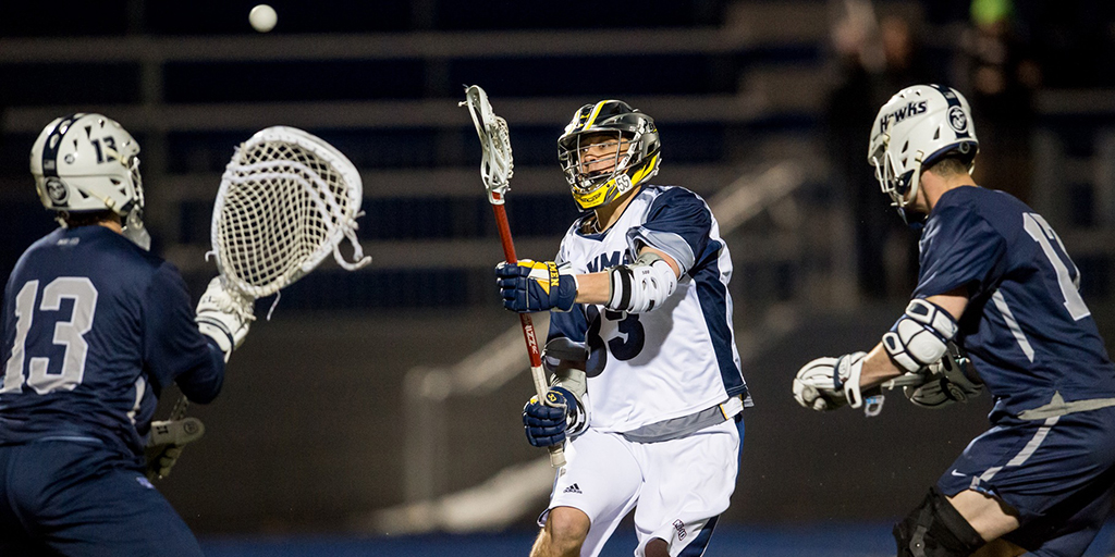 snhupenmen's tweet photo. ON THIS DATE: March 27, 2018 - @penmenlacrosse hosts nationally-ranked Saint Anselm in the first night game in Penmen Stadium history. Senior Zach Tanner recorded a career-best five goals against the 20th-ranked crosstown-rival Hawks. https://t.co/dOAj7eIzB6