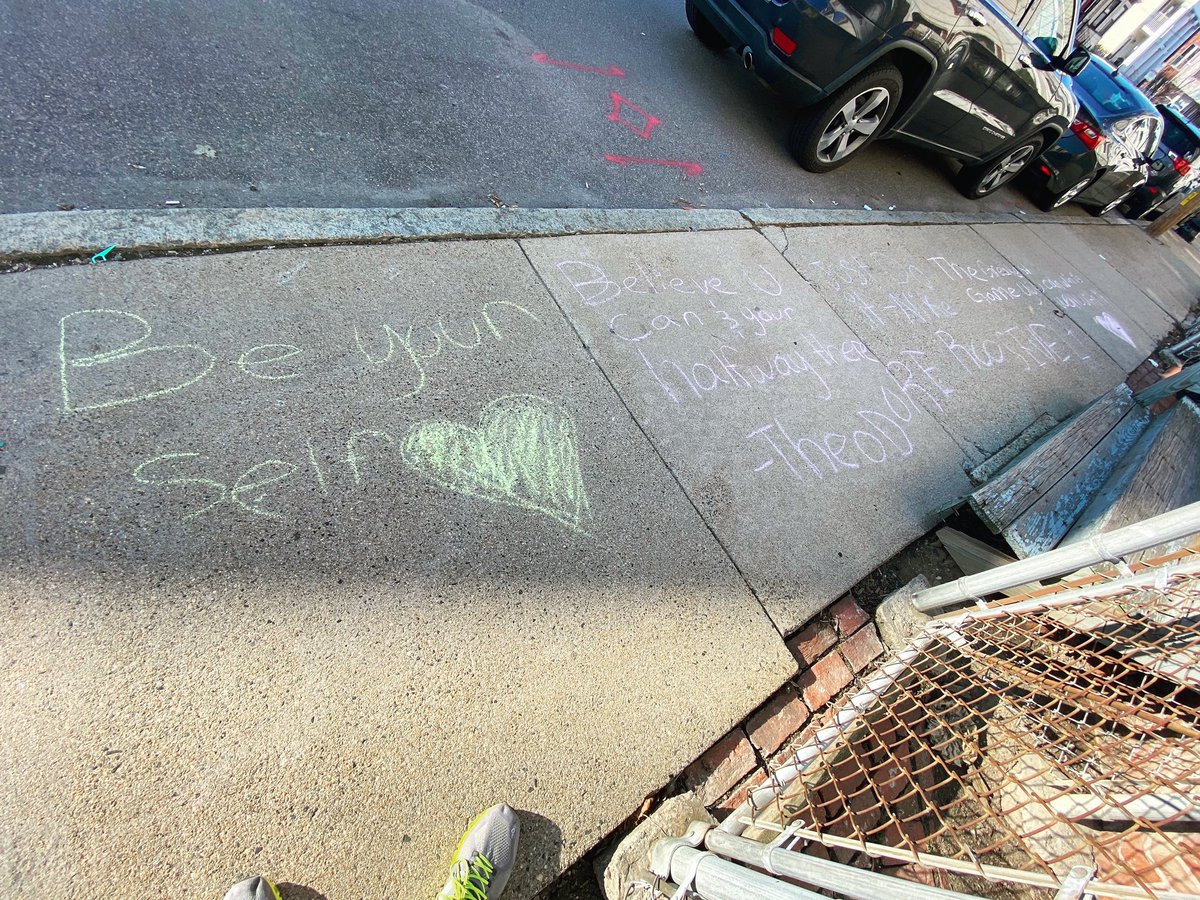 The kids in our neighborhood used chalk to create sidewalk inspo. 
My humblebrag is my running shoes in the corner of this pic.