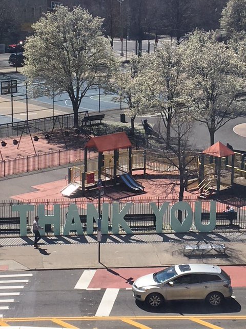 NYCMayor's tweet photo. It feels like there aren’t enough words to express how we feel about the heroes working at @NYCHealthSystem and all our hospitals to save lives in this crisis. 

But the community just left a message across the street from Elmhurst Hospital with the two words we need: https://t.co/lqQyWeiaKT