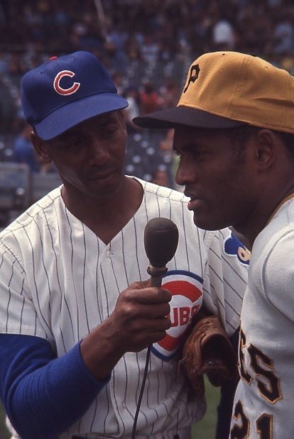 BaseballHistoryNut on X: Ernie Banks famous line was “Let's play two”  well, to honour him today, I will post two pictures of him. Here he is  interviewing Roberto Clemente. Enjoy. #Cubs #Pirates