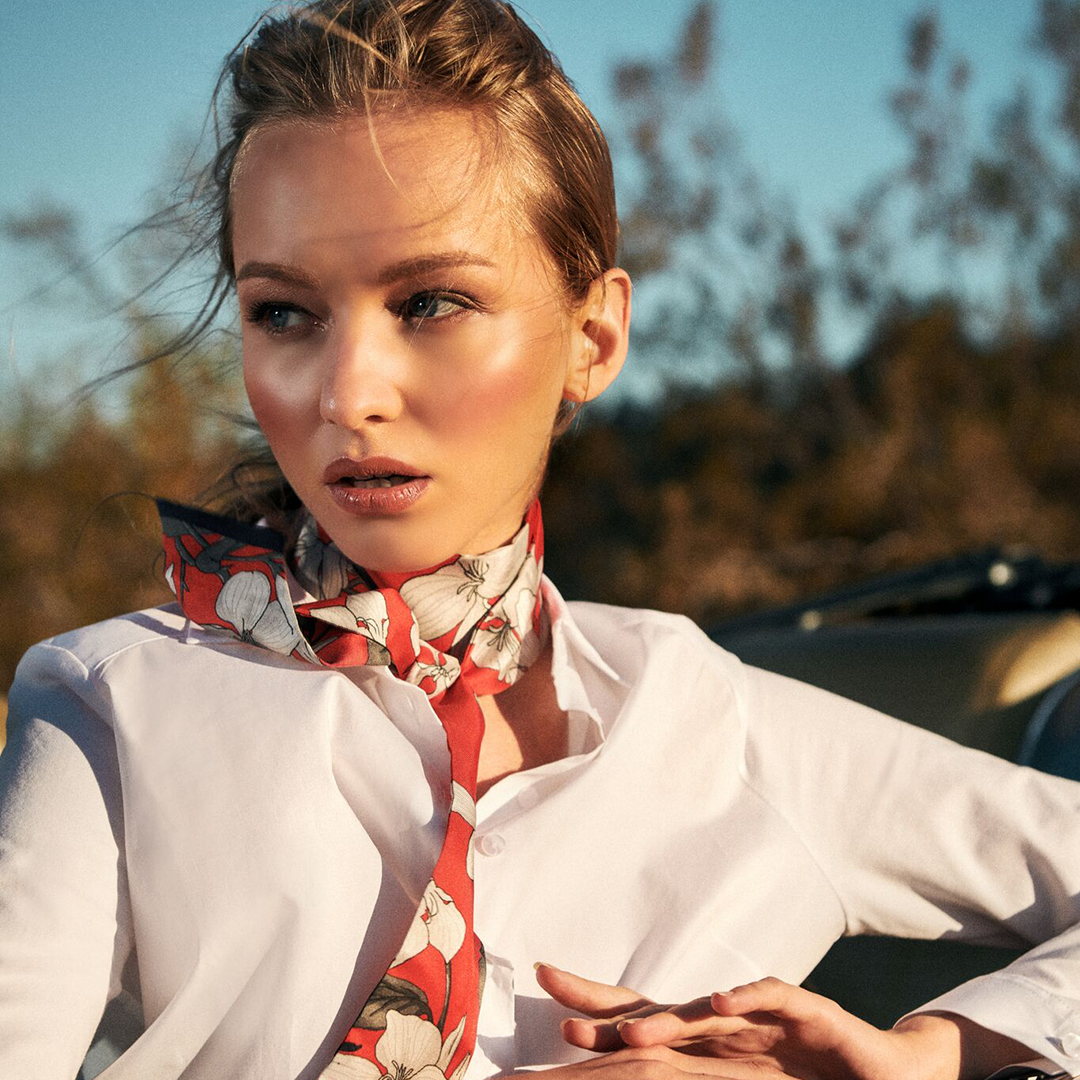 A soft breeze blows on the face - It's the beginning of summer and the fresh air is exhilarating.  Connect to nature with the TAYLER floral twill silk scarf.