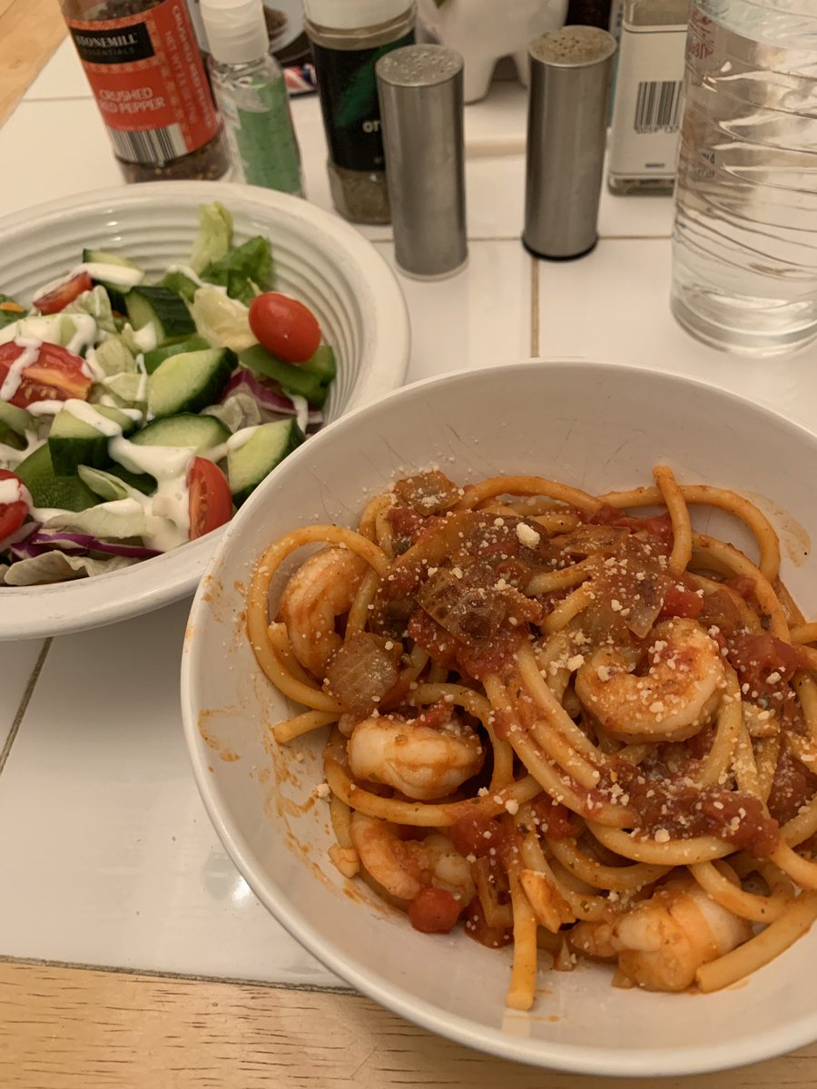 Friday night pasta night!(Bucatini with shrimp and mushrooms in an arrabbiata sauce.)