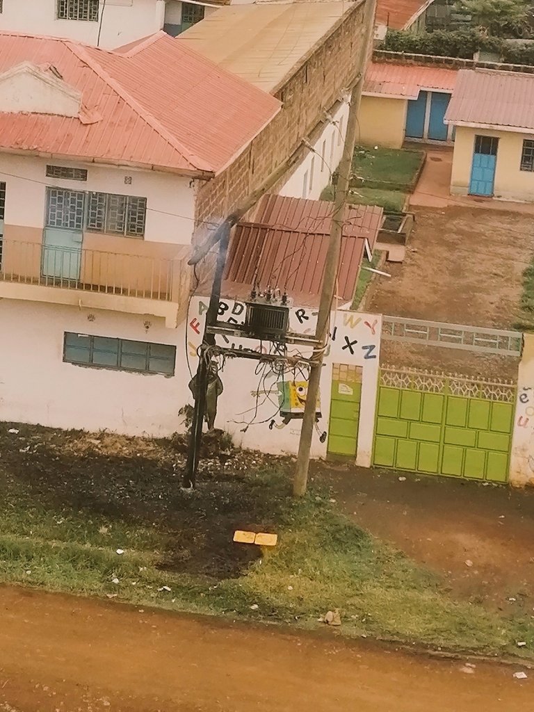 Muli_Kevo's tweet photo. @KenyaPower_Care @KenyaPower This transformer at Ruiru Bypass blew up last night. The fire brigade responded but its still smoking this morning. You need to attend to this to prevent further damage and reconnect us. Its hard to stay indoors without power. #StayHome #coronaviruske https://t.co/sUwyzGsccQ