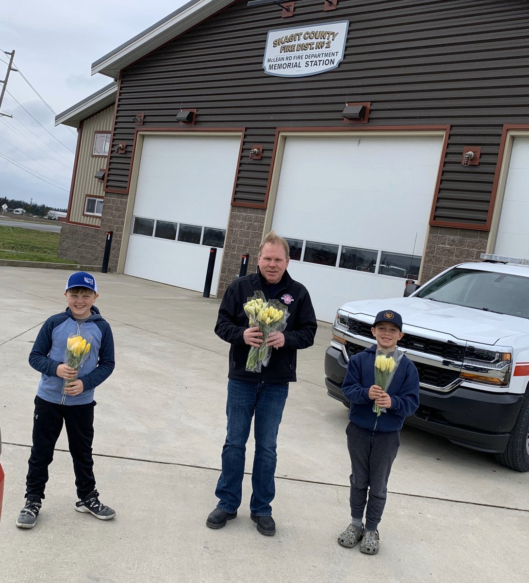 TulipTownWA's tweet photo. #colorforcourage tulips to the men and women on the frontlines today. This is our local volunteer fire station down the street from the farm #Skagit https://t.co/sHXPripeyL