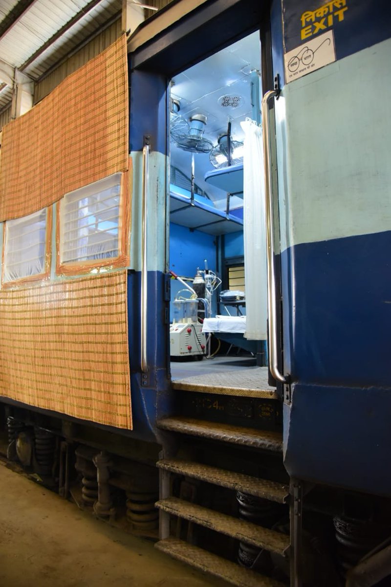 ANI's tweet photo. Isolation coaches have been prepared by Indian Railways to fight the #CoronavirusPandemic; Visuals from Kamakhya Railway Station (Assam) in Northeast Frontier Railway zone. 9 patients can be accommodated in one coach. https://t.co/rU0A5g39AG