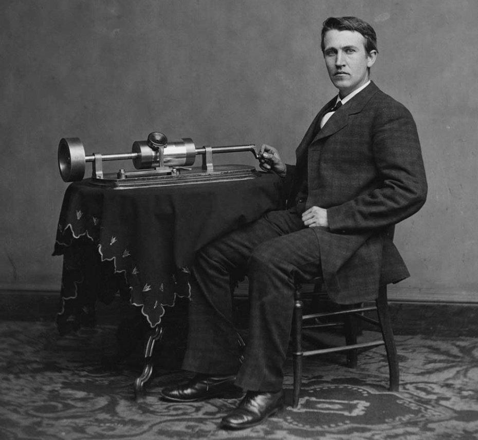 So why do they all sound like that? Well, there are two reasons for that. I will begin with the simple one.You see, the earliest recording set is called Wax Cylinder player. Invented by... guess who?... Well, Thomas Edison, the light-bulb guy. Sometime in late 1800s