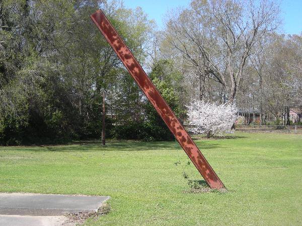 6/10 - Another photo of the 28-foot long steel beam carried from the shopping center in Bennettsville to Zack Rogers parents' yard. It's 8 FEET in the ground.